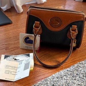Dooney & Bourke Black and Tan Satchel